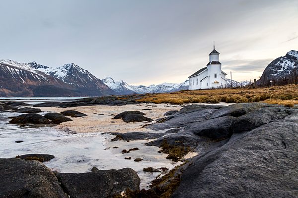 Norway, Lofoten, Lonely church on the coastline of Gimsoy
