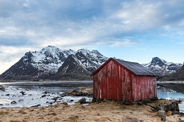 Norway, Lofoten, Old house on the coastline of Vestvagoy
