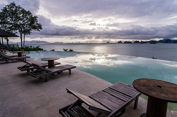 Thailand, Ko Yao Noi, Andaman Sea with swimming pool in foreground