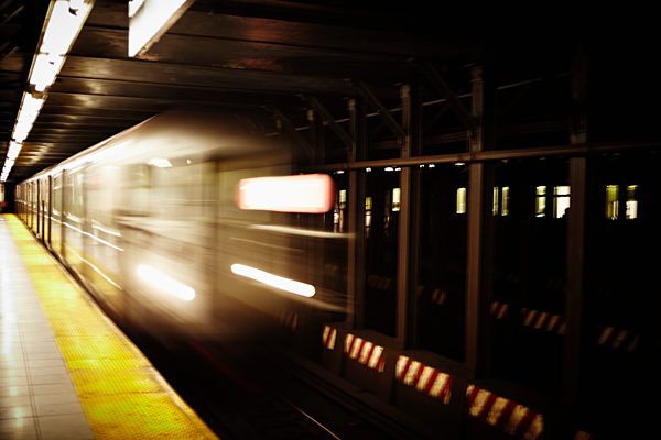 USA, New York, Train passing through subway station
