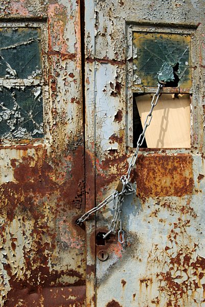 Germany, Brandenburg, Wustermark, Olympic village 1936, detail of rusted garage door