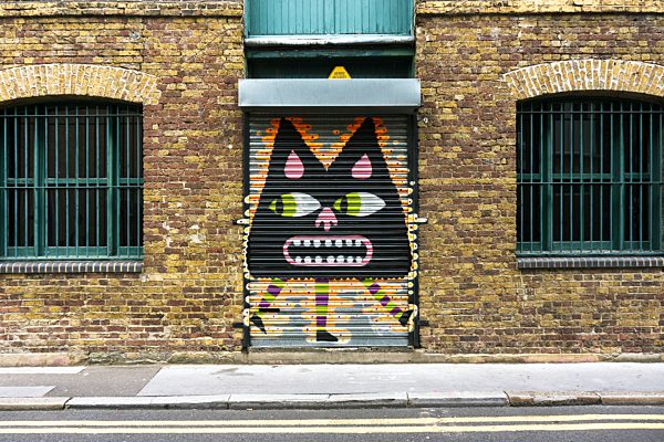 England, London, Shoreditch, Christina Street, graffito of Malarky on shutter