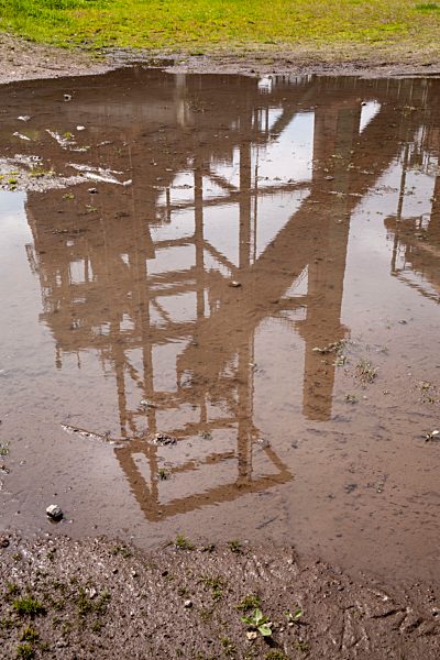 Germany, North Rhine-Westphalia, Dortmund-Hoerde, puddle with reflection of a blast furnace