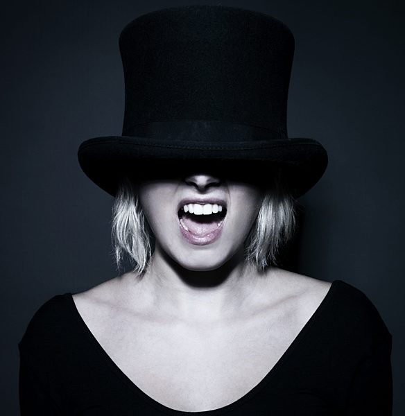 Young woman with mouth open, close up