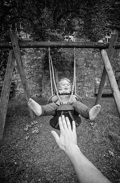 Little boy on swing