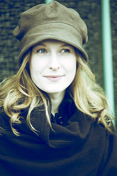Portrait of smiling woman wearing hat