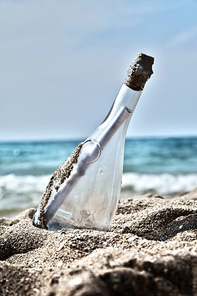 Spain, Palma, Mallorca, Message in bottle at Playa de Palma