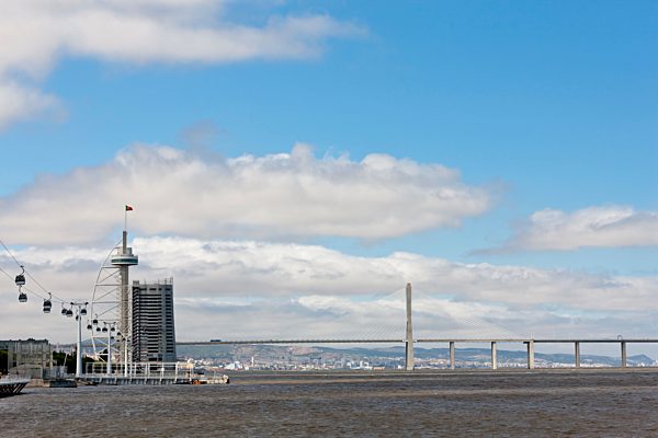 Europe, Portugal, Lisbon, Parque das Nacoes, View of Vasco da Gama tower and Vasco da Gama bridge