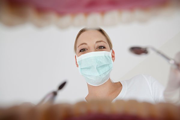 Germany, Dentist with dental equipment in dental office