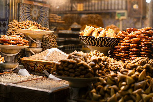 Traditional Moroccan sweets and pastries on display in Fez market