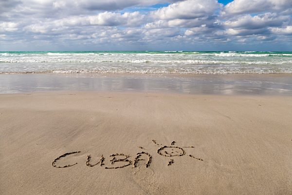 Cuba, Varadero, word 'Cuba' carved in wet sand