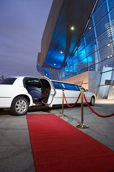 Germany, Munich, stretched limousine at red carpet in front of BMW Welt
