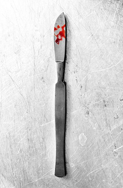Scalpel with blood