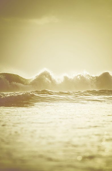Indonesia, Bali, breaking waves in the evening light