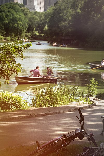 USA, New York City, People rowing on Central Park lake