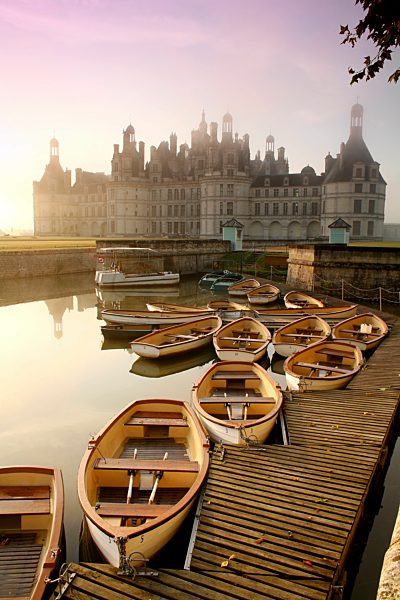 France, Chambord, view to Chateau de Chambord with mooring area in the foreground