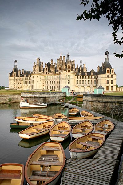 France, Chambord, view to Chateau de Chambord with mooring area in the foreground