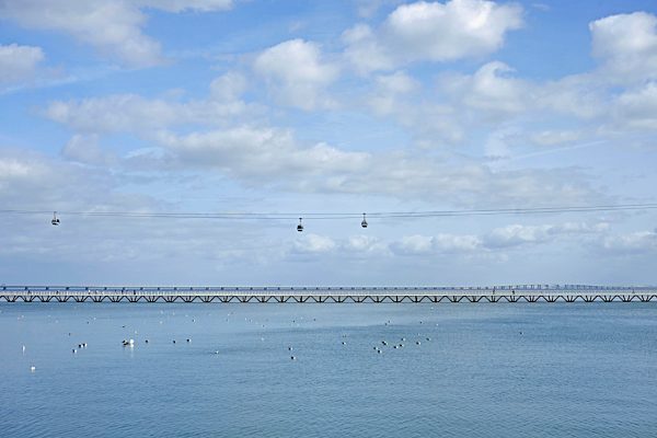 Portugal, Lisbon, view to cable car and Vasco da Gama bridge