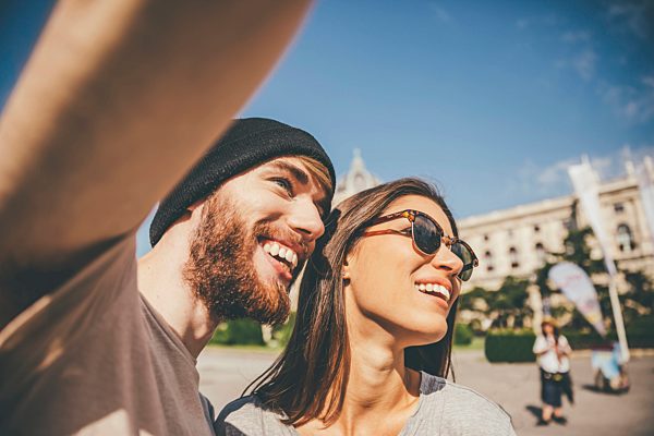 Young couple taking selfie in Vienna
