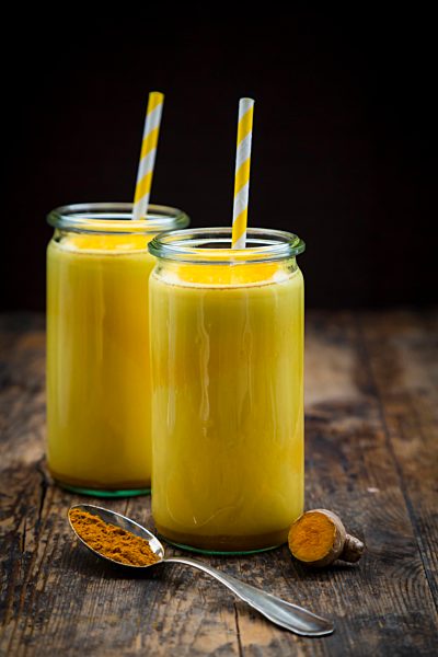 Two glasses of curcuma milk