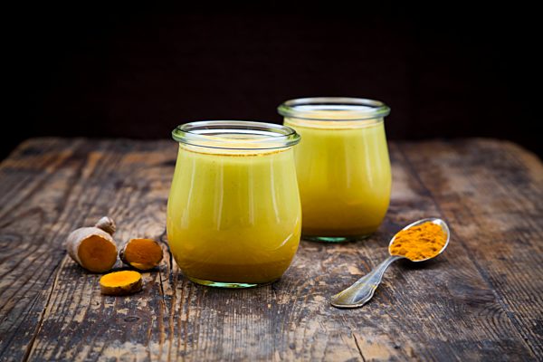 Two glasses of curcuma milk