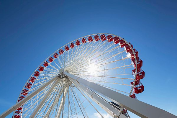 Ferris wheel against blue sky