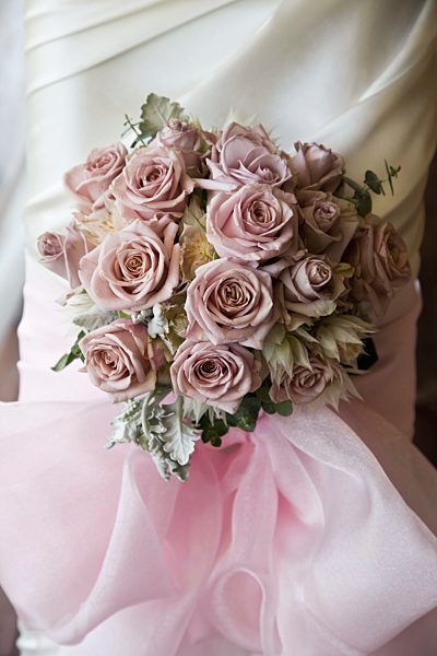 Detail of a floral bouquet attached to a column