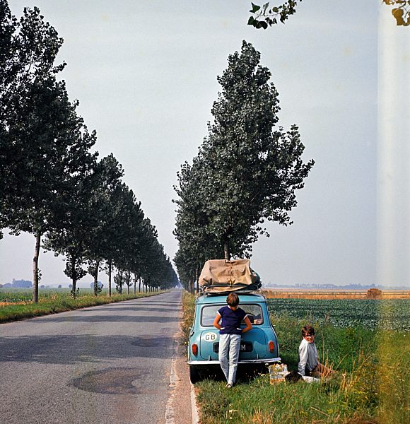 People parked at the side of the road for a picnic