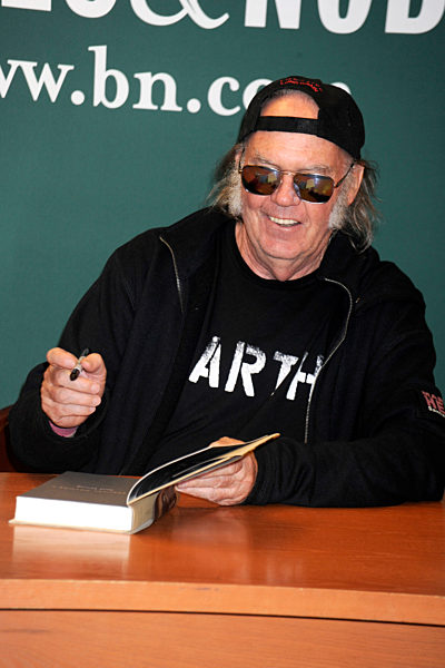 Neil Young Signs Copies Of His Book 'Special Deluxe: A Memoir Of Life And Cars', New York