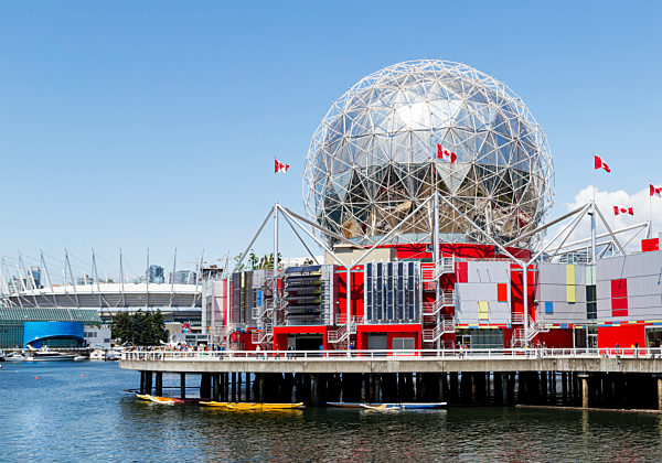 A Sunny Summer Day View Of The Science World Dome On The Vancouver Waterfront With Bc Place Stadium And Downtown Vancouver In The Background; Vancouver, British Columbia, Canada
