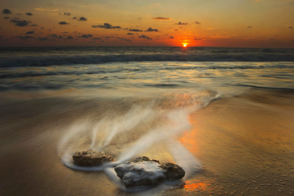 Waves Over Rocks On The Beach At Sunset; Mazatlan, Mexico