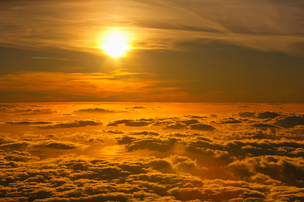Sunset Viewed Above The Clouds At Haleakala National Park; Maui, Hawaii, United States Of America