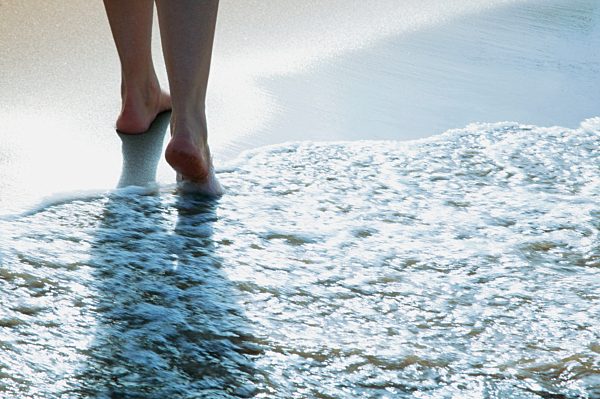 Person walking on the beach