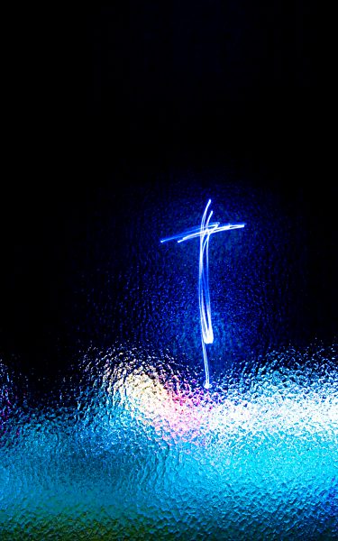 Distinct cross amidst obscurity