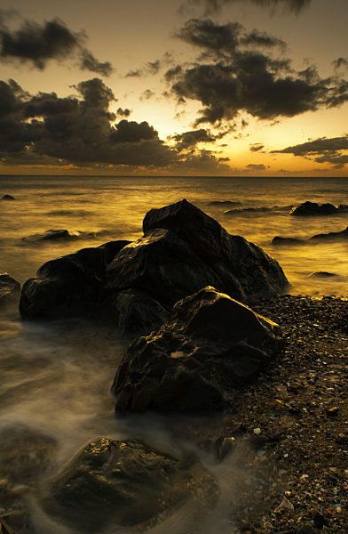 Rocks in shallow water by the shore