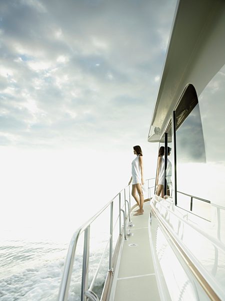 Woman standing on yacht