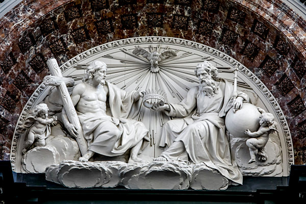 Our Lady cathedral, Antwerp, Belgium. Relief depicting Jesus, God and the Holy spirit.