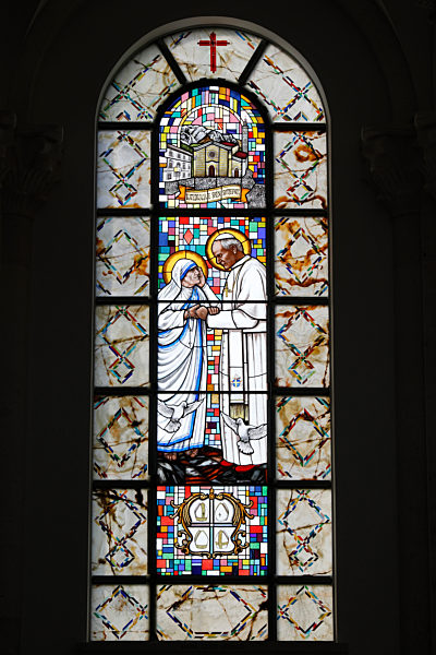 Saint Teresa of Calcutta sanctuary (cathedral), Pristina, Kosovo. Stained glass. Mother Teresa and John Paul II.