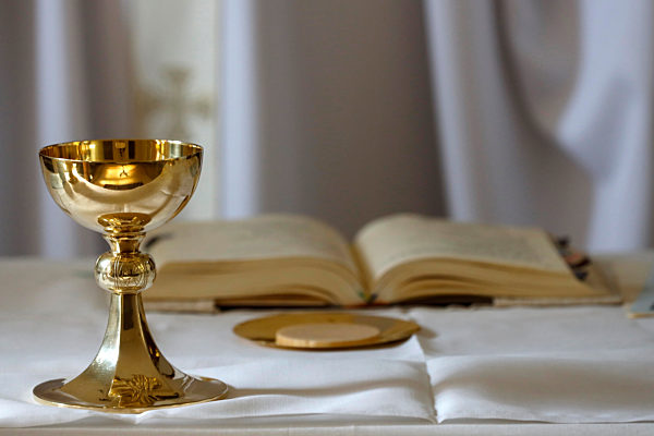 Coronavirus epidemic (covod-19). Celebration of Sunday Mass in a chapel of Saint Joseph des Fins Basilica.  Eucharist celebration.  Annecy. France.