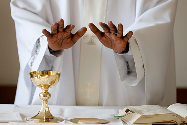 Coronavirus epidemic (covod-19). Celebration of Sunday Mass in a chapel of Saint Joseph des Fins Basilica.  Eucharist celebration.  Annecy. France.