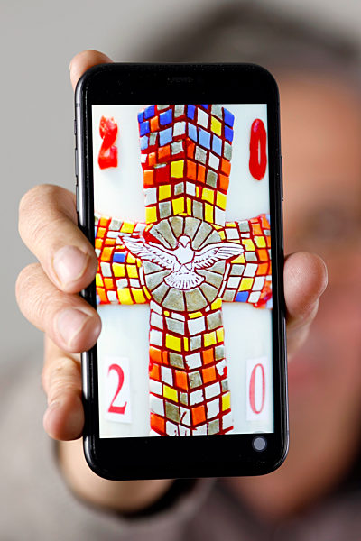 Christianity on an Iphone. Holy Week. Candle Paschal. France.