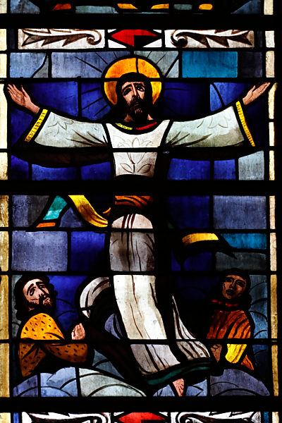 Romainmotier Abbey Church.  Stained glass window.  The ascension of Jesus to heaven. Switzerland.