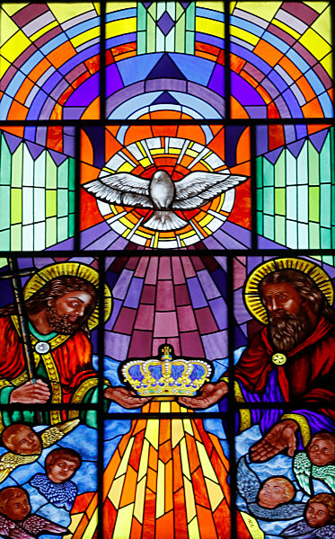 Almudena Cathedral. Stained glass window. Holy Spirit, Jesus and God. Holy trinity.