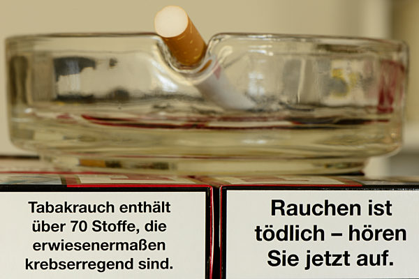 Cigarette packs with health warnings