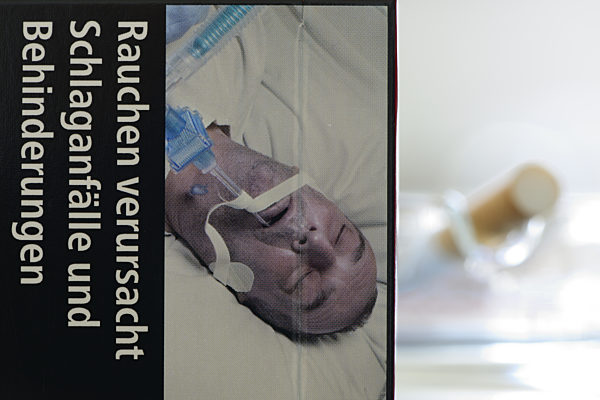 Cigarette packs with health warnings