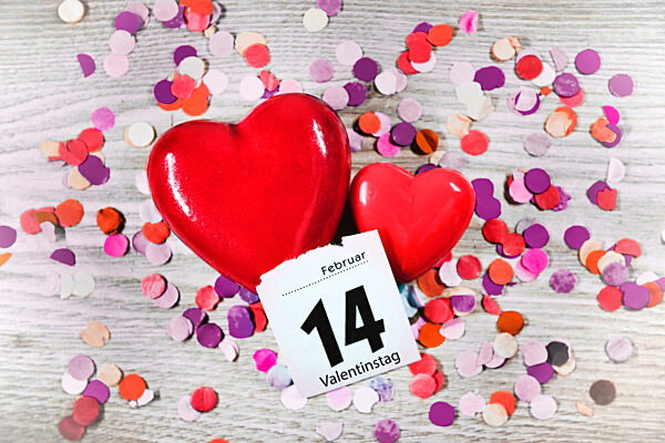 Two Hearts With Confetti And A Calendar Page From February 14, Symbol Photo Valentine's Day