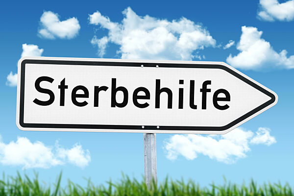 6 April 2024: Signpost In Front Of A Blue Sky With The Inscription - Euthanasia. PHOTOMONTAGE