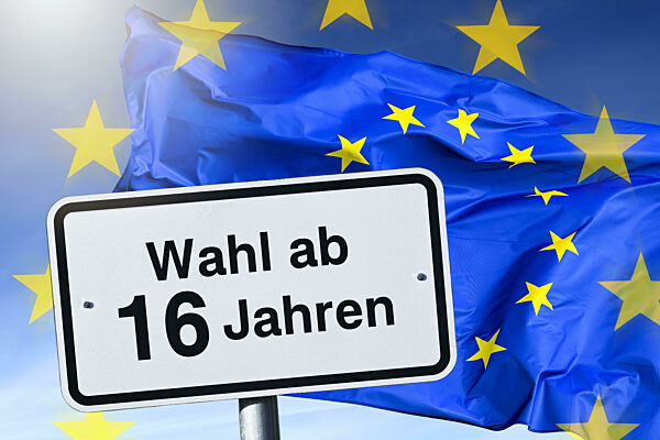Sign With Inscription From 16 Years Of Age In Front Of EU Flag, Symbolic Photo Of Lowered Voting Age For The 2024 European Elections, Photomontage