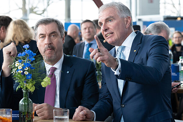 100th Anniversary Of The Lufthansa Group At Flughafen München. Carsten Spohr (Lufthansa, Board, Chairman Of The Executive Board) Is Talking With Dr. Markus Söder (Minister-President Bayern, CSU) While He Is Eating