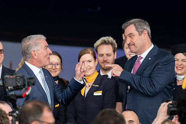 100-year Anniversary Of The Lufthansa Group At Flughafen München. Dr. Markus Söder (Minister-President Of Bayern, CSU) And Carsten Spohr (Lufthansa, Board Member, CEO) Point At Each Other With Their Index Fingers After A Joke.